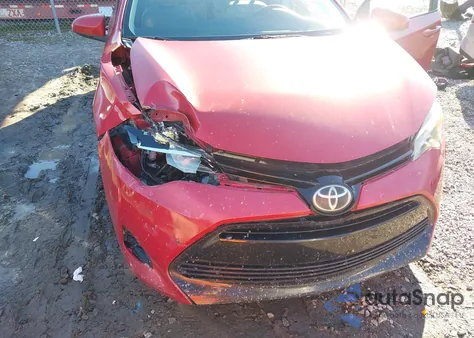 2017 Toyota Corolla Le z USA, uszkodzony, nr VIN 5YFBURHE8HP647071